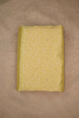 Yellow banarasi silk fabric with intricate floral weaving with beige background