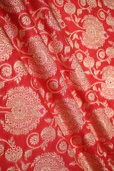 Red fabric with gold floral pattern and meenakari