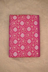 Pink Banarasi Silk fabric with gold and silver zari floral patterns on beige background