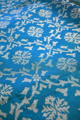 Teal Blue Banarasi Silk Fabric with Gold Zari Ikkat Weaving