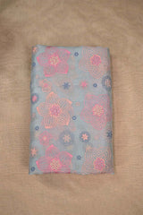 Powder blue organza Silk fabric with multicolor floral embroidery on beige embroidery