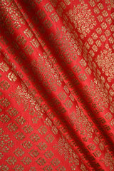 Red fabric with antique intricate patterns
