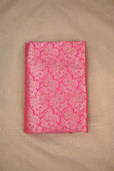 Pink fabric with zari floral pattern
