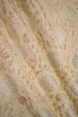 Creamish White Banarasi Silk fabric with gold and silver zari floral patterns