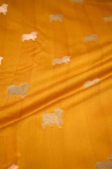 Orange fabric with embroidered animal patterns