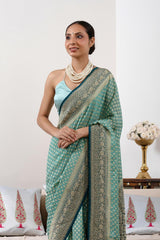Powder Blue Banarasi Georgette Khaddi Silk Saree with Blue Border