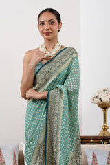 Powder Blue Banarasi Georgette Khaddi Silk Saree with Blue Border