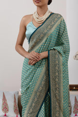 Powder Blue Banarasi Georgette Khaddi Silk Saree with Blue Border