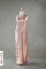 Saree on a mannequin with a gray background and '25% Off' label.