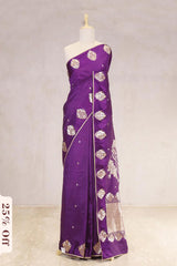 Purple saree with white floral patterns on a mannequin against a white background