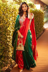Meenakshi Chaudhary in red Banarasi silk saree in a recent wedding look