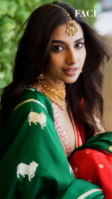 Meenakshi Chaudhary in Green Banarasi silk saree in a recent wedding look