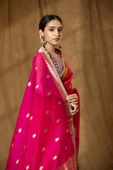 Alia Bhatt in red and pink saree design in a wedding