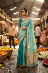turquoise and mint green shaded Banarasi organza silk saree with gold zari buti and lace border