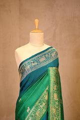 Green Banarasi Raw Silk Saree with Pichwai Cow Designs