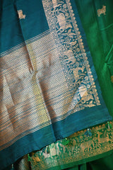 Green Banarasi Raw Silk Saree with Pichwai Cow Designs