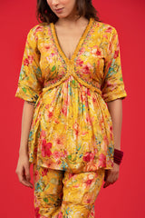 This is a yellow Co Ord set with floral prints for women