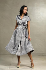 A woman in a Silver Tissue silk Party Wear Dress