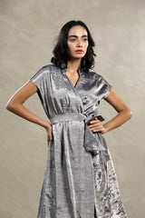 A woman in a Silver Tissue silk Party Wear Dress