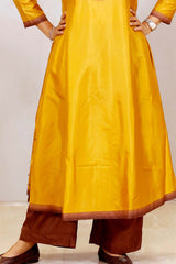Yellow Pure Silk Kurta Set With Zari Border