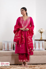 Woman wearing a pink traditional outfit in a living room setting with a '25% off' promotional banner.