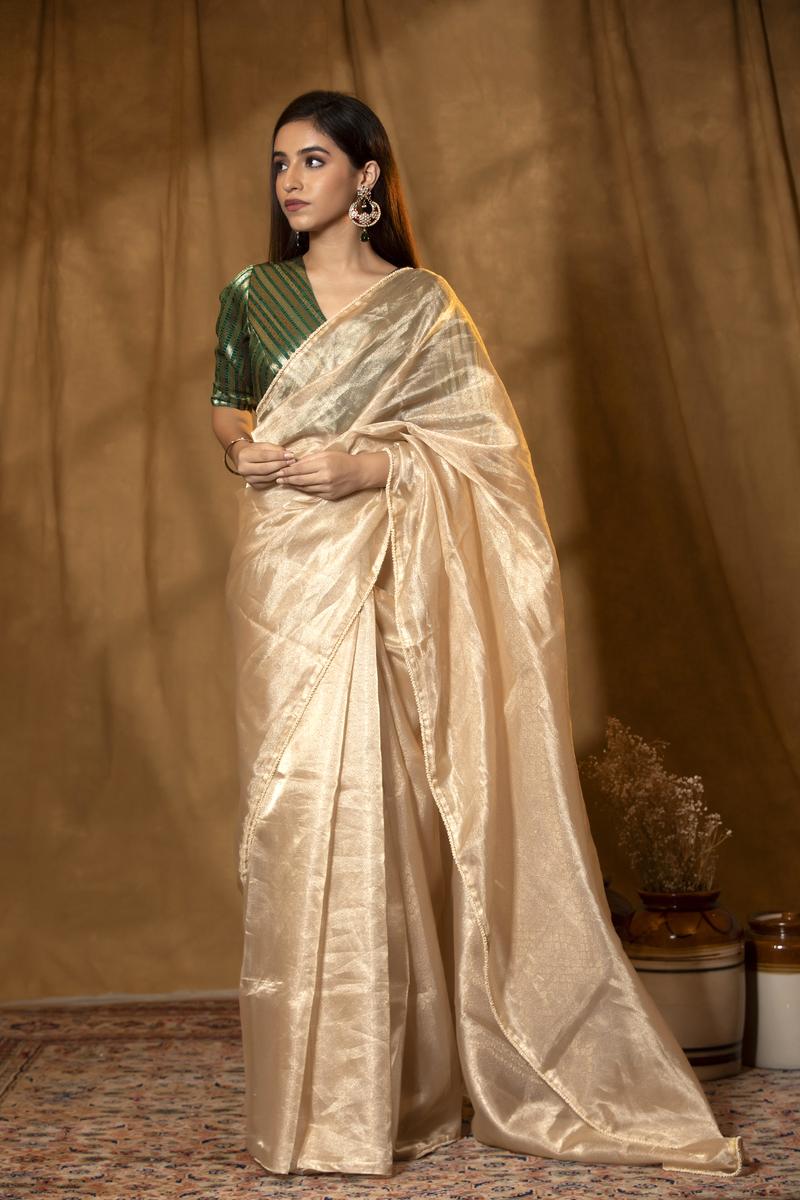 Beige Pure Tissue Saree with Pearl Embellished Border