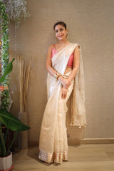 Surbhi Chandna in an off white tissue silk Banarasi saree and pink blouse