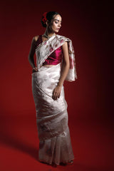 Woman wearing a traditional outfit with a red background