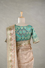 Golden White Tissue Silk Saree with Blue Designer Blouse