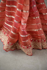 Rust Red Tissue Silk Saree with Silver Zari Stripes and Beads