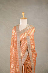 Orange Tissue Silk Saree With Embellished Lace Border