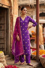 Gold zari woven Pichwai motifs on a Purple Chiniya silk unstitched suit set paired with a dual-tone sequence embroidered organza dupatta.