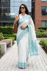 Women in White & Teal Banarasi Cotton Saree with Resham Weaving