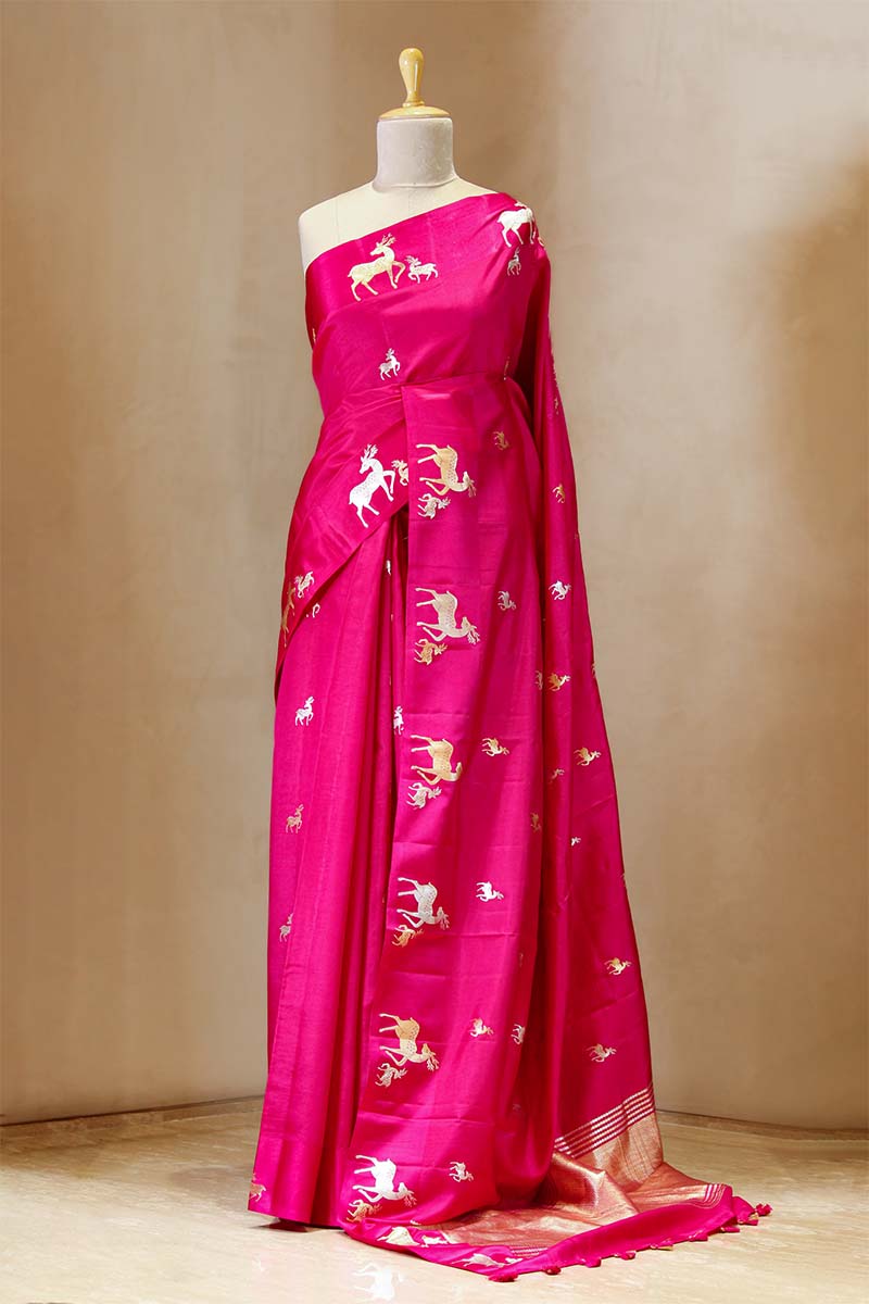 This Pink Deer Motifs Handloom Banarasi Silk Saree is a wedding saree and festive wear saree. Free Shipping Available!