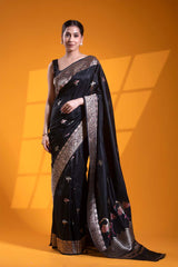 This Black Handloom Katan Silk Banarasi Saree with Ustra Pakshi Motifs is a wedding saree and festive wear saree. Free Shipping Available!