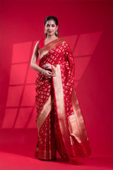 This Red Banarasi Saree with Gold and Silver Zari Floral Work is a wedding saree and festive wear saree. Free Shipping Available!