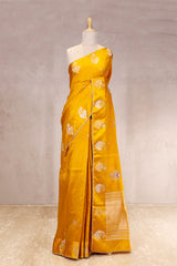 This Yellow Handloom Banarasi Silk Saree with Ganesh Mantra Embellished Pallu is a wedding saree and festive wear saree. Free Shipping Available!
