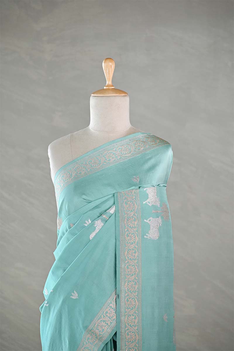 Powder Blue Satin Saree with Gold & Silver Zari Pichwai Motifs