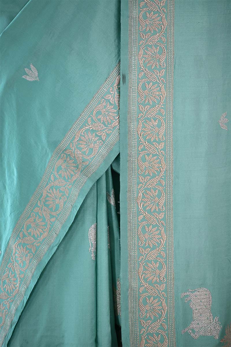 Powder Blue Satin Saree with Gold & Silver Zari Pichwai Motifs