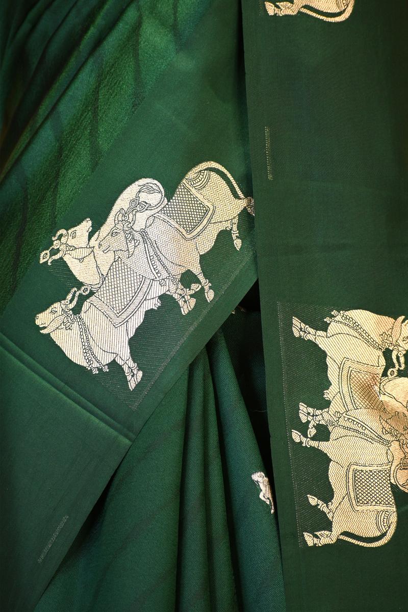 Bottle Green Banarasi Silk Saree with Tanchoi  And Zari Cow Motifs