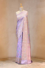 Close up of Lilac Katan Silk Saree showing Real Silver Zari and Resham floral jaal with paisley border details.