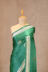 Sea Green Satin Silk Banarasi Saree with Floral Motifs