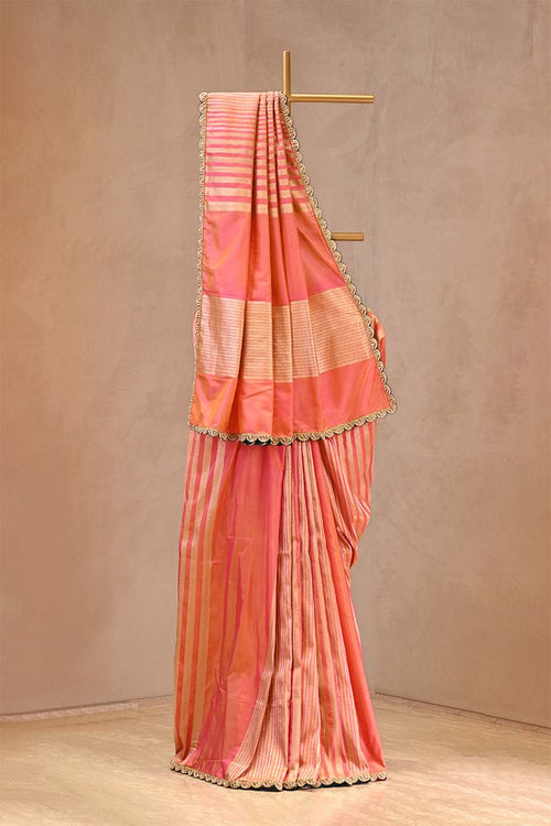 Peach Banarasi Katan silk saree with gold and silver zari geometric stripes and lace border