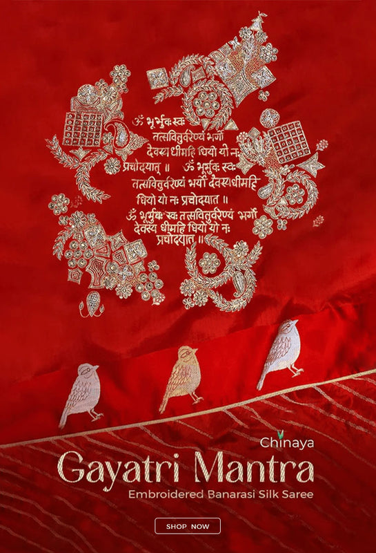 Embroidered Banarasi Silk Saree with Gayatri Mantra design on a red background