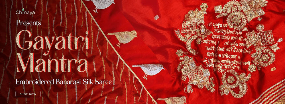 Embroidered Banarasi Silk Saree with Gayatri Mantra design on a red background