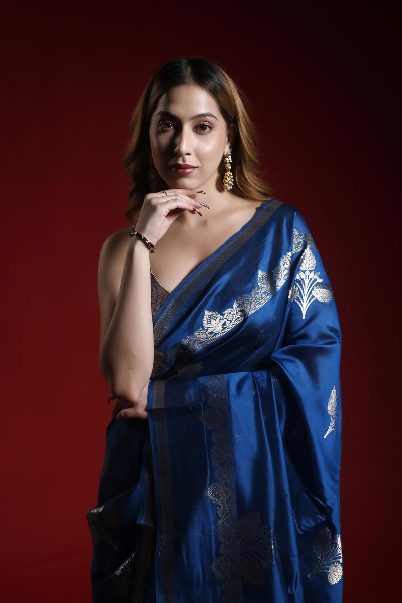 This blue handloom chiniya Saree is a wedding saree and festive wear saree. Free Shipping Available!