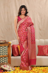 Bridesmaid wearing Red Semi Banarasi Katan Silk Saree showing gold zari floral weaving with resham detailing and floral border.