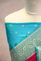 Pink Semi Satin Silk Saree with Contrast Sky Blue Floral Gold Zari Border