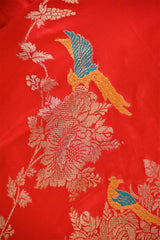 Crimson Red Semi Satin Silk Saree with Golden Floral Vines and Parrot Motifs
