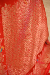 Crimson Red Semi Satin Silk Saree with Golden Floral Vines and Parrot Motifs